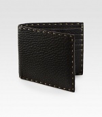 Pebbled leather design accented by intricate stitch detail for a modern finish.Two billfold compartmentsEight card slotsLeather5W x 4HMade in Italy