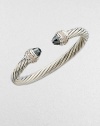 From the Cable Collection. Two beautifully, faceted hematite stone caps accented with dazzling diamonds on a sterling silver cable cuff. HematiteDiamonds, .48 tcwSterling silverDiameter, about 2½Slip-on styleImported 