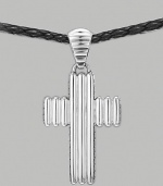 A ridged cross pendant crafted in polished silver hangs from a woven cord of soft leather. From the Bedeg Collection Silver Leather Pendant, 1W X 2¼H Necklace, adjustable 26-28 Lobster clasp Imported 