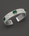 Sterling silver cuff set with faceted white sapphires and green quartz. By Judith Ripka.