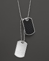 Diamantissima etching in sterling-set black enamel gives these dog tags an unmistakable Gucci twist.