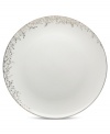 Fringed with shimmering leaves of platinum and mica, these bone china dinner plates from Mikasa turns your table into a springtime utopia. Its sleek coupe shape is a vision of modern elegance in platinum-banded white.