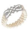 Support a worthy cause with style. Carolee's 40th Anniversary Limited Edition stretch bracelet, crafted from silver-tone mixed metal, features two rows of glass pearls for twice the glamour. Approximate length: 7-1/2 inches.