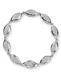 Shapely pavé-adorned crystal stations impart elegant allure to Nadri's navette bracelet, refined in rhodium-plated metal.