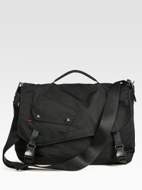 A traditional messenger with downtown edge, features a removable crossbody strap, ample pockets and additional padding for your computer devices.Flap, buckle closureTop handleAdjustable shoulder strapExterior, interior pocketsNylon18W x 11H x 5DImported