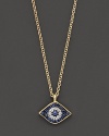 Adorn yourself with sparkling diamonds and sapphires set in a 14K yellow gold pendant inspired by ancient traditions.