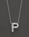 From the Tiny Treasures collection, a diamond P necklace. With signature ruby accent. Designed by Roberto Coin.