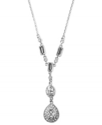 Exude 1950s era elegance in this vintage-inspired classic by Givenchy. Y-shaped pendant features round-cut and rectangular crystals set in silver tone mixed metal. Approximate length: 15 inches.