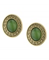 Spruce up in serene, jade-colored studs. 2028's pretty oval button earrings feature Greek key edges in gold tone mixed metal with a green cabochon stone at center. Approximate diameter: 3/4 inch.