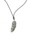 Stand apart from the flock in this free-spirited style. Fossil's fashionable feather pendant features abalone shell inlay and clear crystal pave. Cord crafted from chocolate brown leather with a lobster claw clasp. Approximate length: 24 inches + 2-inch extender. Approximate drop: 2-3/4 inches.