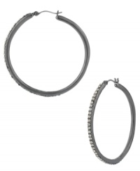 Add some sparkle to your hoops with this pair of earrings from Kenneth Cole New York. Crafted from hematite-tone mixed metal, the earrings dazzle with the lustrous touch of glass pave accents. Approximate diameter: 2 inches. Approximate drop: 2 inches.