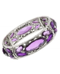 Slip on pretty purple hues. This stretch bracelet by 2028 features captivating amethyst plastic beads and simulated marcasite. Crafted in silver tone mixed metal. Stretches to fit wrist. Approximate length: 7 inches.