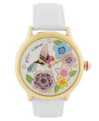 Take some time to smell the flowers. Betsey Johnson brings a nectar-sweet watch crafted of white leather strap and round gold tone stainless steel case. White dial features a multi-color floral and hummingbird graphic, crystal dot markers at twelve, three, six and nine o'clock, gold tone hour and minute hands, signature fuchsia second hand and logo. Quartz movement. Water resistant to 30 meters. Two-year limited warranty.