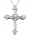 This beautiful cross pendant is gracefully adorned with round-cut diamonds (1/2 ct. t.w.) set in 14k white gold. Drop measures approximately 1 inch. Chain measures 18 inches.