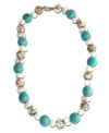 A careful arrangement of turquoise (15 mm), Mother of Pearl (14 mm) and cultured freshwater pearls (8 mm) transcend the ordinary to create a necklace of sheer depth and beauty. Set in sterling silver. Approximate length: 18 inches.