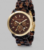 Tortoise shell design adds elegance to a chronograph style with shiny gold IP accents, bringing true luxury just a little bit closer to your wrist. Japanese analog movement Waterproof up to 5 ATM 40mm case with IP (ionic plating) gold elements Chocolate brown mother-of-pearl dial Three chronograph sub dials Round face Stone double indexes Second hand Acrylic tortoise shell bracelet Imported