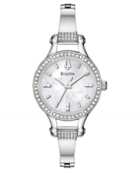 A beautiful, retro-inspired watch with everlasting glamor. Silvertone stainless steel bangle bracelet and round case with crystal accents. Round mother-of-pearl dial with logo and stick indices. Quartz movement. Water resistant to 30 meters. Three-year limited warranty.