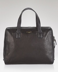 In butter-soft leather and a structured shape, this satchel from Olivia Harris means business.