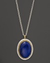 Framed in sterling silver and 24K gold, a lapis stone shines on Gurhan's Parliament necklace.