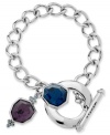 Like links? This bracelet from T Tahari, crafted from silver-tone, nickel-free mixed metal, has a toggle closure and is adorned with purple and blue accents. Approximate length: 7-1/2 inches + 1-inch extender.