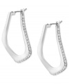 Abstract elegance. This pair of oval hoop earrings from Robert Lee Morris is crafted from silver-tone mixed metal with glass pave crystal accents providing a lustrous touch. The sculptural shape enhances the appeal. Approximate drop: 1-1/4 inches. Approximate diameter: 1/2 inch.