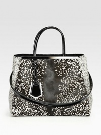 Luxurious haircalf in an abstract animal print with patent leather trim and signature hardware.Double patent leather top handles, 5½ dropDetachable patent leather shoulder strap, 13¼ dropSnap strap closureProtective metal feetOne zip and two open compartmentsTwo inside open pocketsFully lined14W X 10¾H X 6DMade in Italy