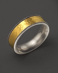 Sterling silver frames a bold gold band. By Gurhan.