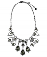 Dynamic and dazzling. Givenchy's collar necklace, crafted from hematite-tone mixed metal, is adorned with colorful glass stones and cubic zirconia accents for a bold statement. Approximate length: 16 inches + 2-inch extender.