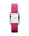 A fine stainless steel dial tops a slim, sophisticated Michael Kors watch set on brightly hued leather strap.