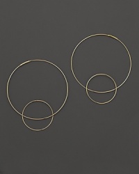 Like magic, smaller hoops balance on 14K gold counterparts.