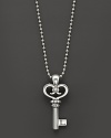 This key is designed with Caviar™ beading, fluted accents and logo/crest; on a silver ball chain. Designed by Lagos.