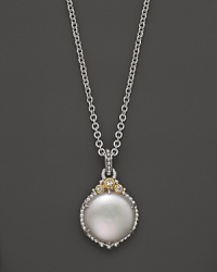 A stunning cultured pearl pendant necklace, framed in sterling silver.