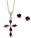 Symbolic sparkle. Victoria Townsend's beautiful matching jewelry set features a pair of stud earrings and pendant in the shape of a cross. Crafted in 18k gold over sterilng silver, highlighting round and pear-cut garnets (2-1/2 ct. t.w.). Approximate length: 18 inches. Approximate drop: 1-1/4 inches. Approximate diameter: 3/16 inch.