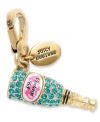 Pop champagne with this sparkly charm from Juicy Couture. This limited edition design is embellished with turquoise glass pave accents and epoxy detail. Finished with a clasp closure. Crafted in gold tone mixed metal. Approximate drop: 2 inches.