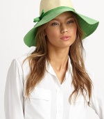 A sweet topper with a colorblock brim and bow that keeps the sun out of your eyes. Viscose/paperBrim, about 4Imported