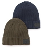 Solid ribbed beanie crafted in a cozy cotton/wool blend, with leather logo patch.