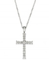 Slim and resplendent, this beautiful cross pendant features round-cut diamonds (1/4 ct. t.w.) set in 14k white gold. Approximate length: 16 inches. Approximate drop: 1 inch.