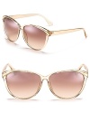 Retro-inspired cat eye sunglasses with contrast winged detail.