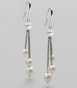 From the Pearl Collection. Triple sterling silver chain links with round pearl drops.Pearl Sterling silver Length, about 2 French earwires Imported 