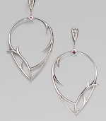 From the Rapture Collection. Curving thorns emerge on this sculptural design of polished sterling silver with vibrant ruby accents. Ruby Sterling silver Drop, about 3 Post back Imported 