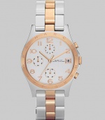 A classic chronograph dial with rose gold accents and bracelet link strap.Quartz movement Water resistant to 3 ATM Logo engraved rose gold bezel Light silver chronograph dial Arabic numeral hour markers Date display at 3 o'clock Second hand Stainless steel and rose gold link bracelet, 18mm, (.71) Imported 