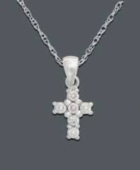 A sparkling token of your faith. Delicately small cross pendant features round-cut diamond (1/8 ct. t.w.) set in 14k white gold. Approximate length: 18 inches. Approximate drop: 1/2 inch.