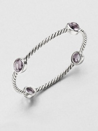 From the Renaissance Collection. Softly hued ovals of faceted amethyst are dotted along a classic twisted cable of sterling silver in this pretty bangle.AmethystSterling silverDiameter, about 2.25Slip-on styleImported