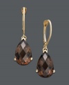 Add chic sparkle in warm brown hues. Earrings feature a faceted pear-cut smokey quartz drop (5-3/4 ct. t.w.) set in 14k gold. Approximate drop: 1 inch.