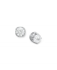 Traditional diamond stud earrings with an intricate twist. Each pair features a bezel-set diamond in the side, as well as a round-cut diamond at front (total 1/2 ct. t.w.). Set in 14k white gold. Approximate diameter: 4-1/10 mm.