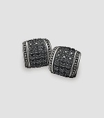 Engraved sterling silver is trimmed with rows of diamond-cut, black sapphires. 1.83 tcw About ¾ X ¾ Made in USA