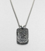 Textural elements in sterling silver enhanced with sophisticated black diamond refines this signature dog tag necklace design.Sterling silverBlack diamondPendant, 1 x 1½Length, about 22Imported