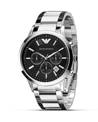 A classic look with a sleek profile, this Armani watch features all analog display - including second and date - and a comfortable steel link bracelet.