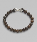 EXCLUSIVELY AT SAKS. From the Spiritual Bead Collection. Rustic bronzite beads are a bold contrast to the refinement of a sterling silver claw-design clasp.Beads, 8mm Length, about 8½ Spring clip clasp Imported