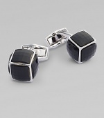 Discretely dazzling, each face of these cufflinks have a square multi-faceted Swarovski element crystals with the whale tail positioned on the 6th face.Rhodium-plated metalAbout ½ diam.Made in the United Kingdom